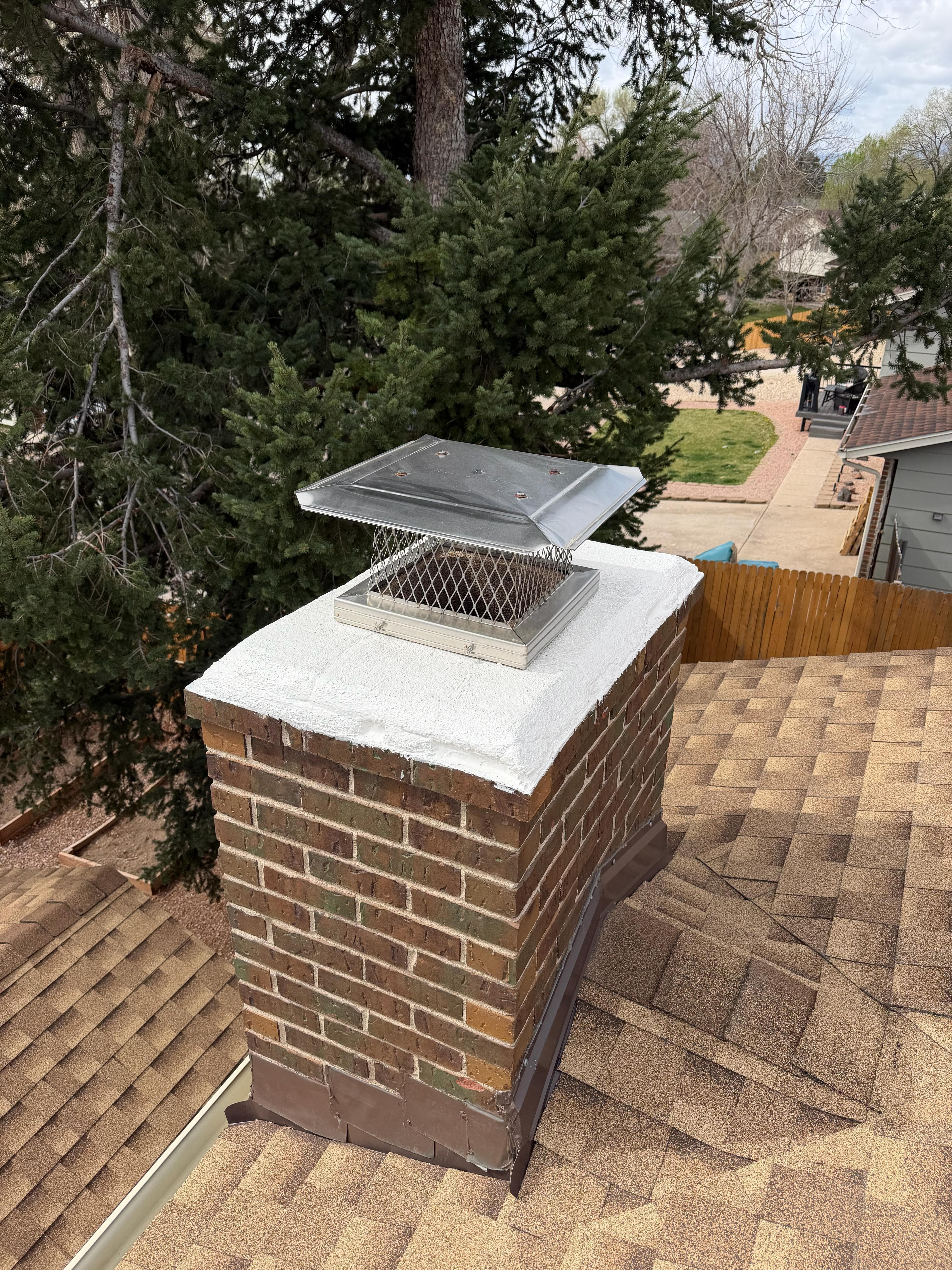 Chimney cap and crown restoration on a Colorado home