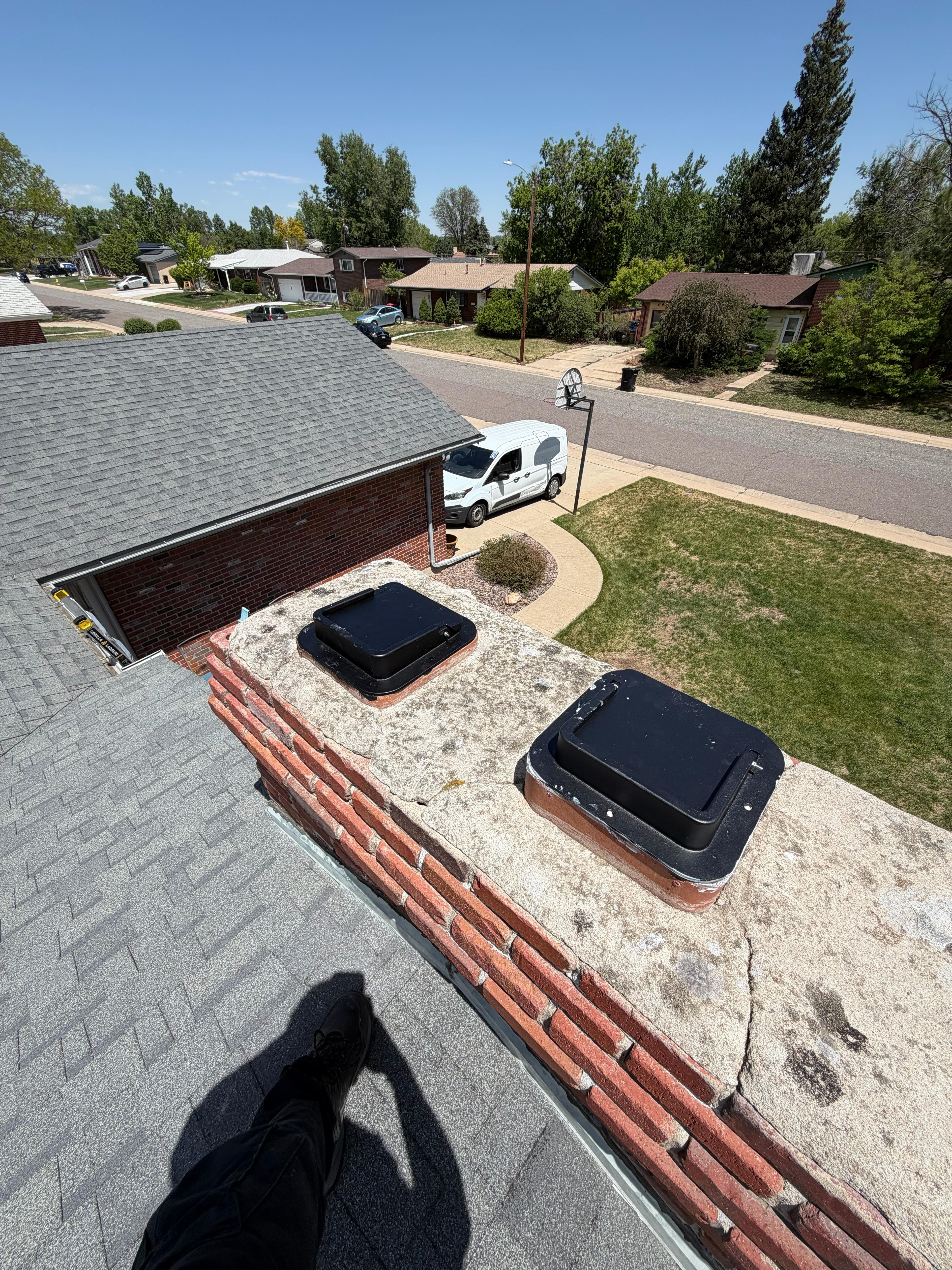 Custom chase cover installed on a Front Range chimney