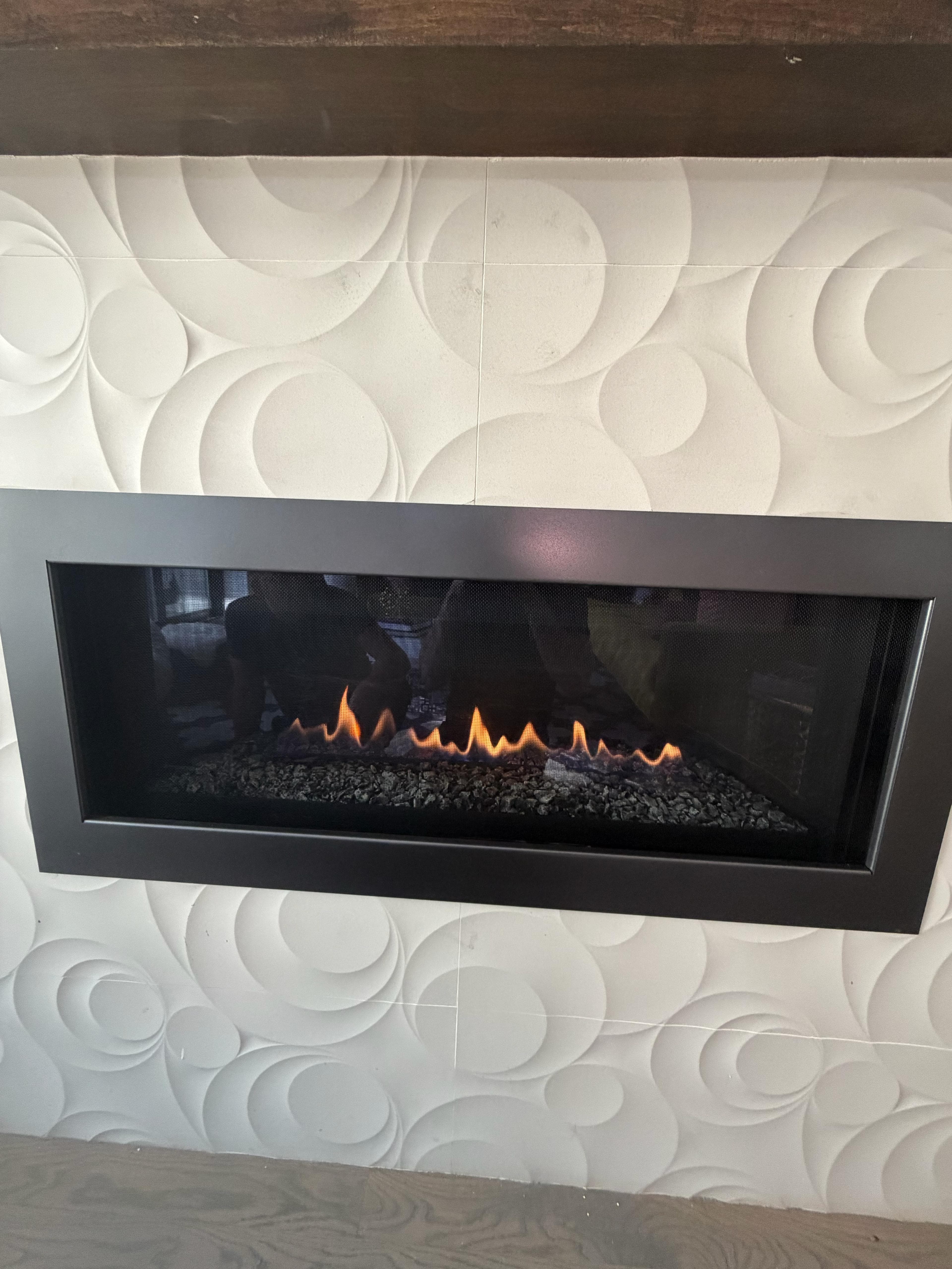 Modern linear gas fireplace repair