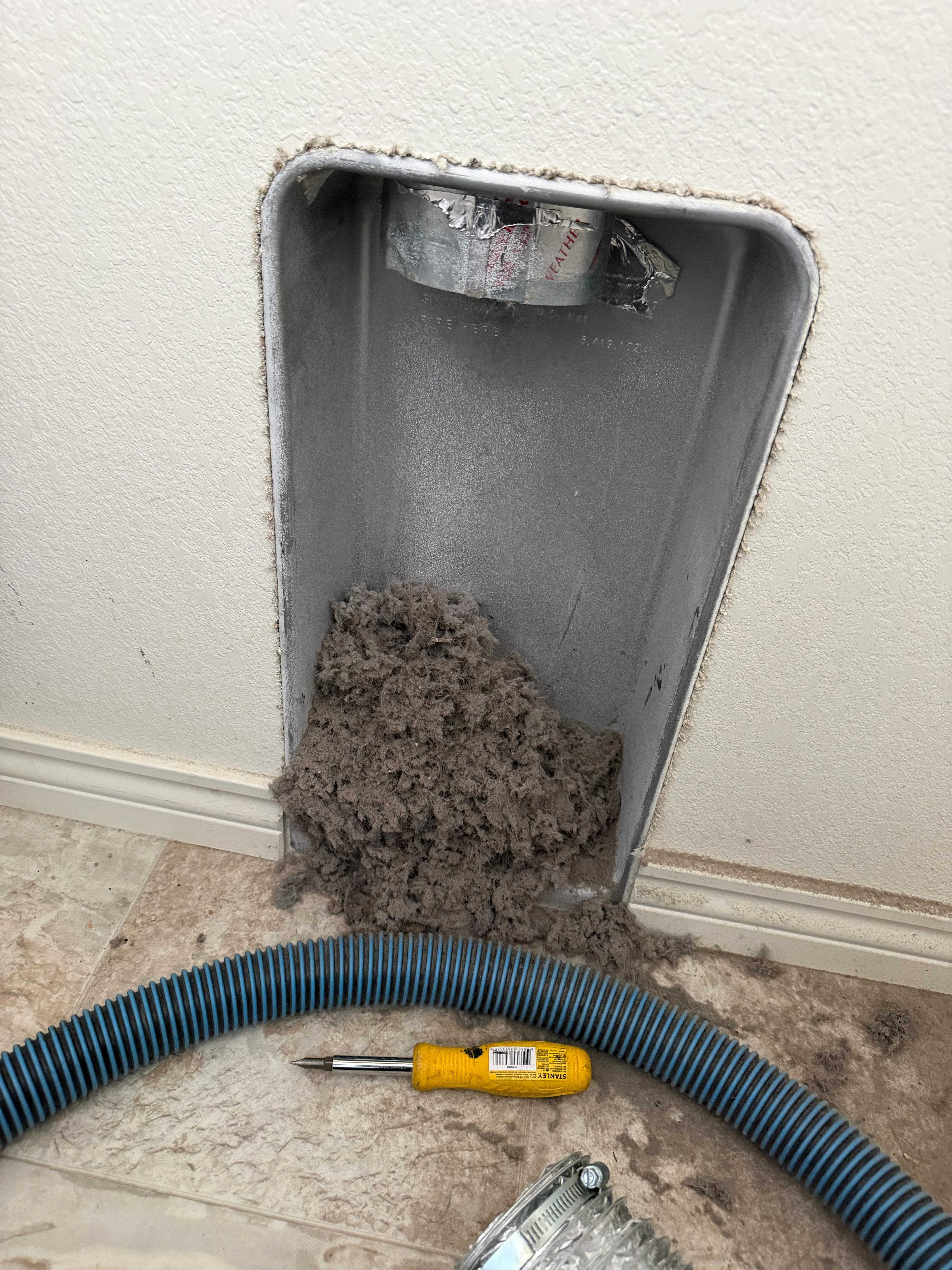 Dryer vent cleaning to remove lint buildup
